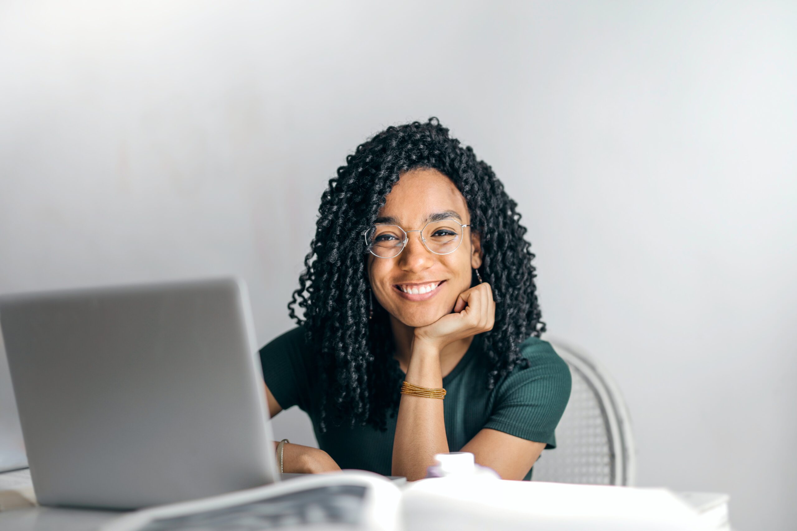 woman sitting in front of computer